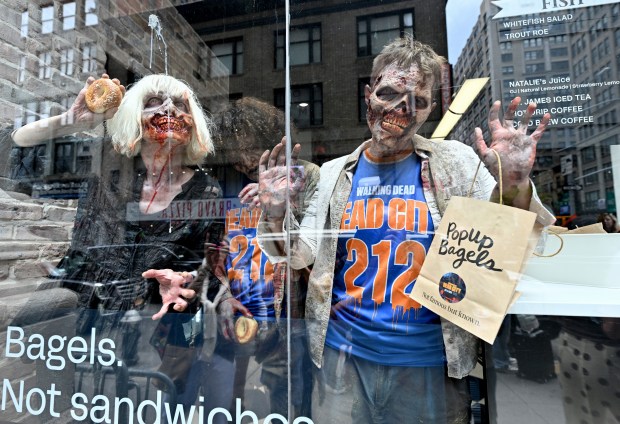 NEW YORK, NEW YORK - JULY 11: Walkers participate in Dead City NYC Activation on July 11, 2026 in New York City. (Photo by Roy Rochlin/Getty Images for AMC Global Media )