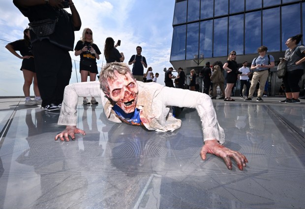 NEW YORK, NEW YORK - JULY 11: A walker participates in Dead City NYC Activation on July 11, 2026 in New York City. (Photo by Roy Rochlin/Getty Images for AMC Global Media )
