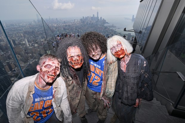 NEW YORK, NEW YORK - JULY 11: Walkers participate in Dead City NYC Activation on July 11, 2026 in New York City. (Photo by Roy Rochlin/Getty Images for AMC Global Media )