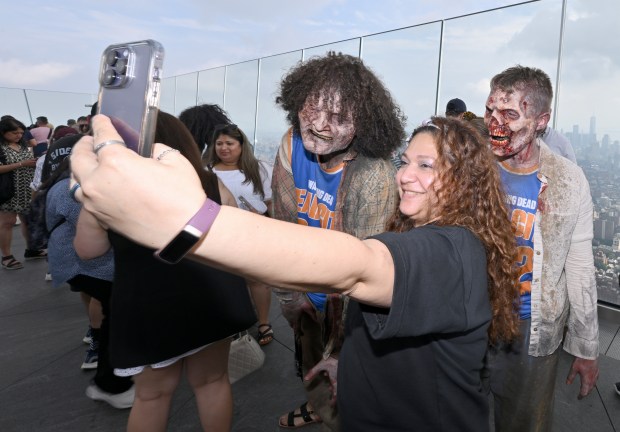 NEW YORK, NEW YORK - JULY 11: Walkers participate in Dead City NYC Activation on July 11, 2026 in New York City. (Photo by Roy Rochlin/Getty Images for AMC Global Media )