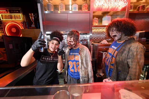 NEW YORK, NEW YORK - JULY 11: Walkers participate in Dead City NYC Activation on July 11, 2026 in New York City. (Photo by Roy Rochlin/Getty Images for AMC Global Media )