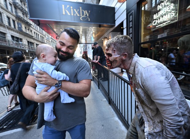 NEW YORK, NEW YORK - JULY 11: Walkers participate in Dead City NYC Activation at Black Tap Craft Burgers & Beer on July 11, 2026 in New York City. (Photo by Roy Rochlin/Getty Images for AMC Global Media)