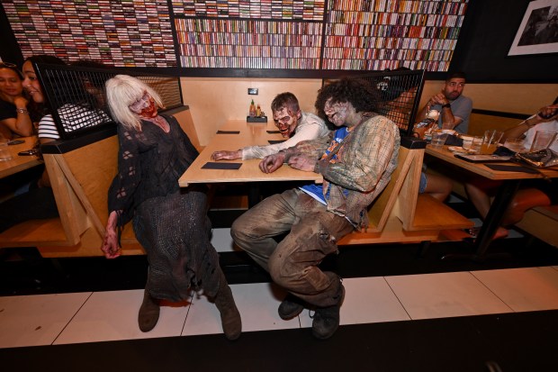 NEW YORK, NEW YORK - JULY 11: Walkers participate in Dead City NYC Activation at Black Tap Craft Burgers & Beer on July 11, 2026 in New York City. (Photo by Roy Rochlin/Getty Images for AMC Global Media)