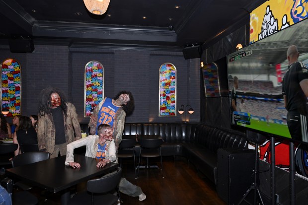 NEW YORK, NEW YORK - JULY 11: Walkers participate in Dead City NYC Activation at Black Tap Craft Burgers & Beer on July 11, 2026 in New York City. (Photo by Roy Rochlin/Getty Images for AMC Global Media)