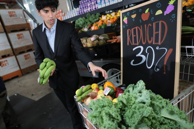 A display for a news conference shows reductions in food prices as New York City Mayor Zohran Mamdani visits a food distribution center on July 27, 2026 in Brooklyn. (Photo by Spencer Platt/Getty Images)