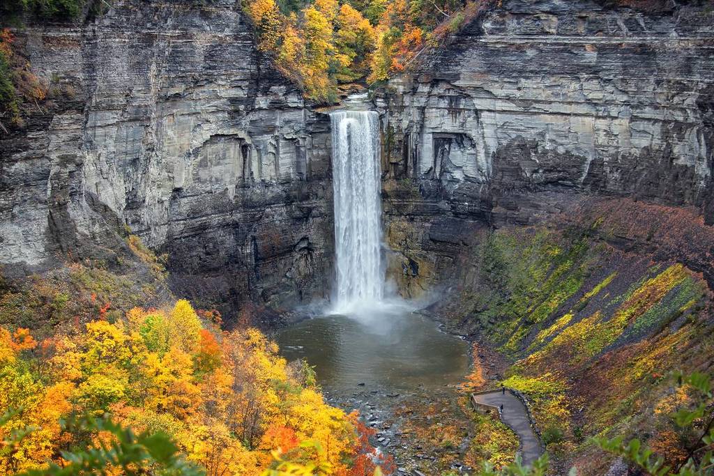 Taughannock Falls is located in Ulysses in the mountain at Watkins Glen state park of New York State. ,at time during fall