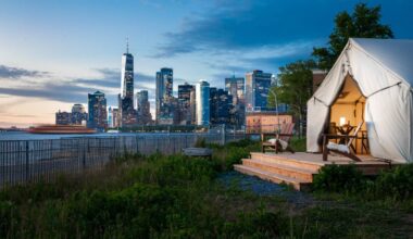 Only an 8 minute ferry from Manhattan: this luxury waterfront glamping retreat is hosting morning yoga, nightly s’mores, and 250th anniversary ship flotilla views during this year’s July 4th weekend