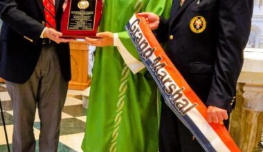 Knights honor grand marshal at pre-parade Mass