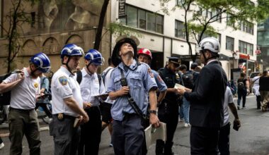 Emergency workers gathered in midtown Manhattan after several buildings were evacuated due to the potential collapse of one of them on Tuesday.