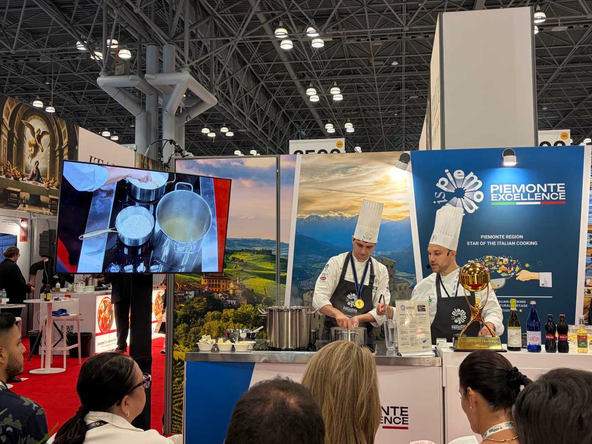 A live cooking demonstration at the Fancy Food Show.