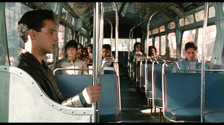 Teenage Calogero rides a city bus in a pivotal scene from Robert De Niro's A Bronx Tale.