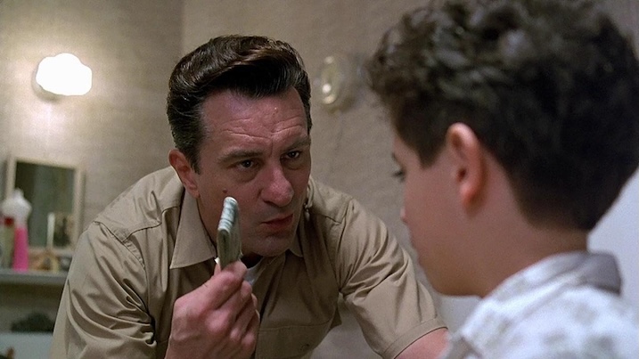 Robert De Niro as Lorenzo speaks to young Calogero in a bathroom scene from A Bronx Tale.