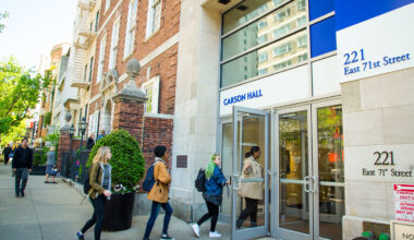 Students walking outside Carson Hall, Northeastern University's New York City campus at 221 East 71st Street.