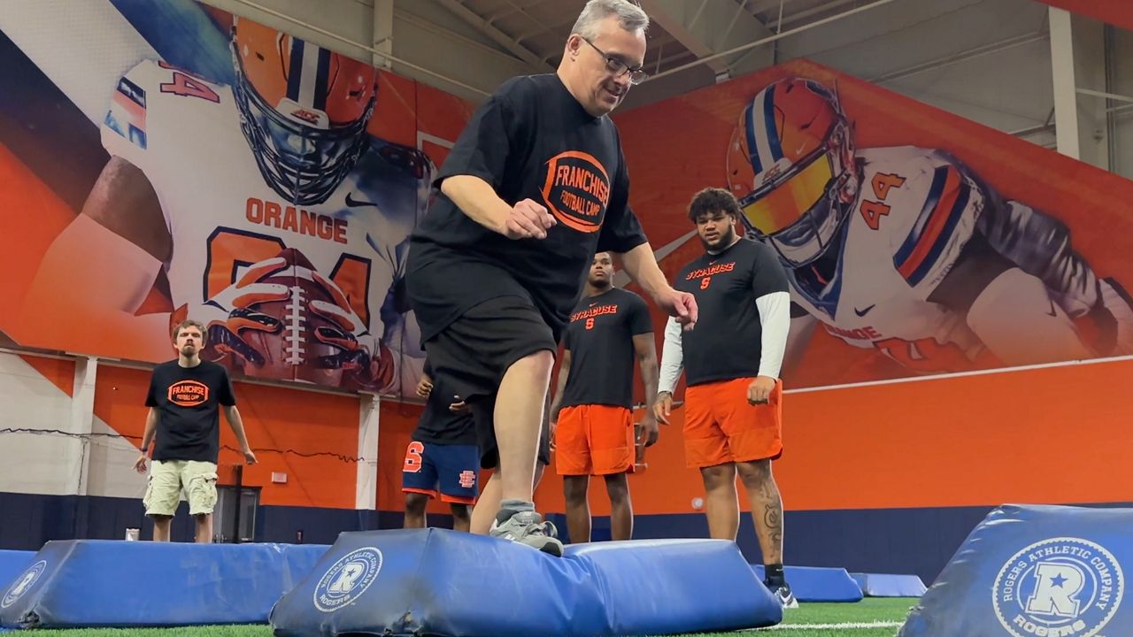 Football players host special day to train with the team