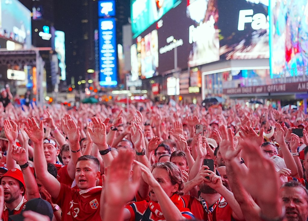 Norway fans cheer on their team outside Times Square ahead of  the team's 2-1 wi over Brazil in a Round of 16 World Cup match on July 3, 2026.