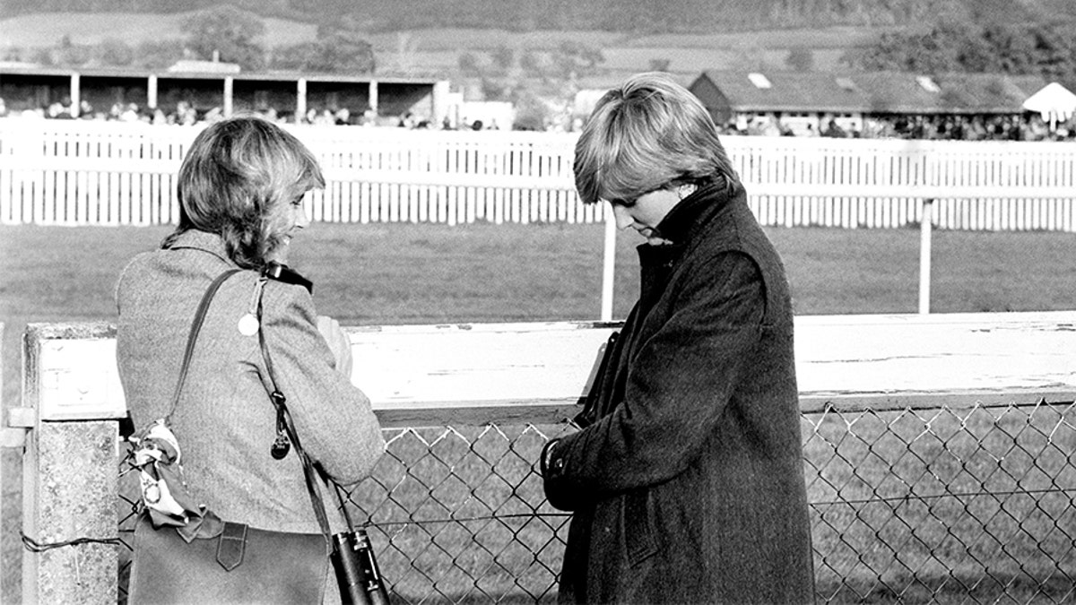 Lady Diana Spencer speaking to Camilla