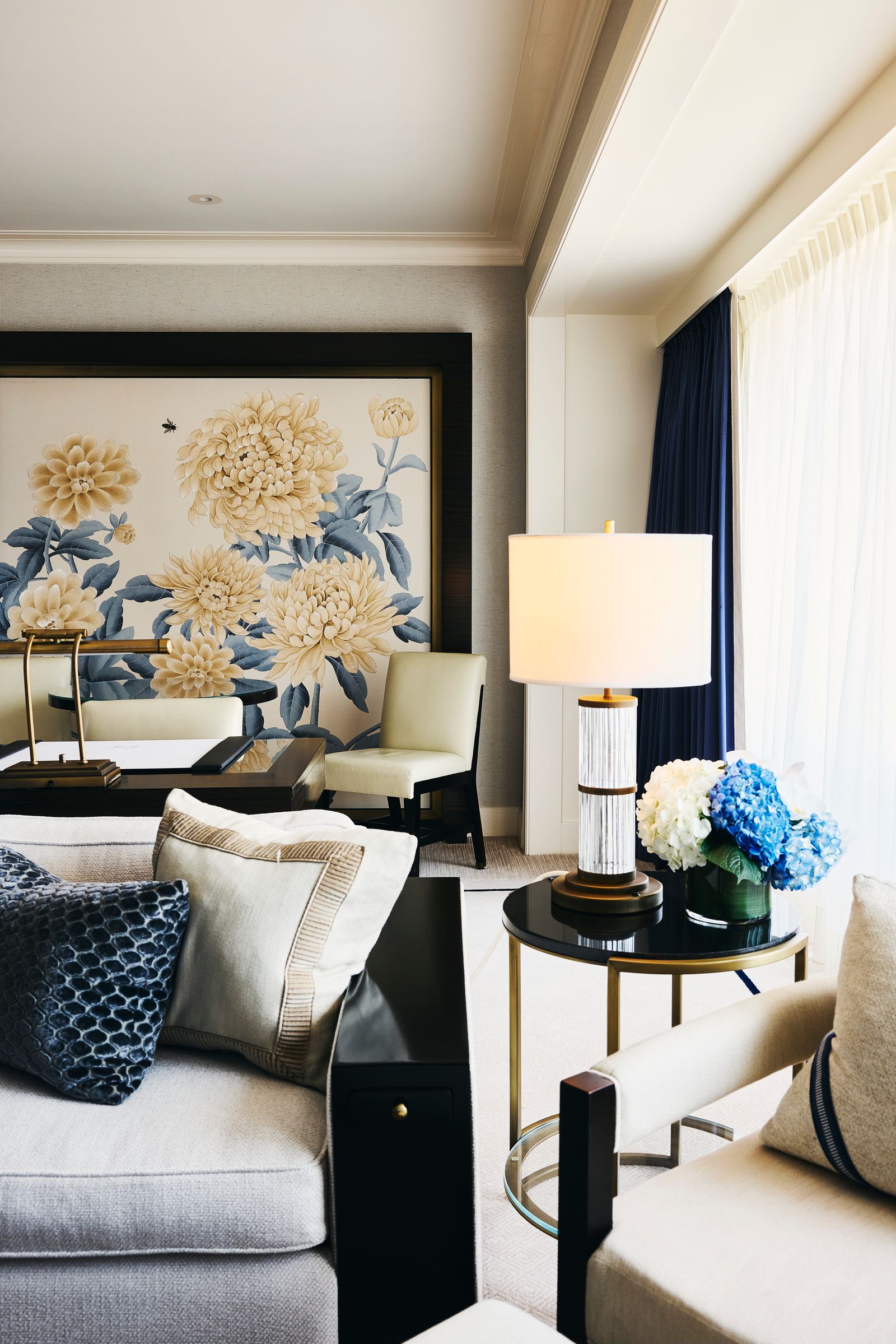 Image may contain Cushion Home Decor Lamp Pillow Furniture Table Couch Chair Architecture Building and Indoors
