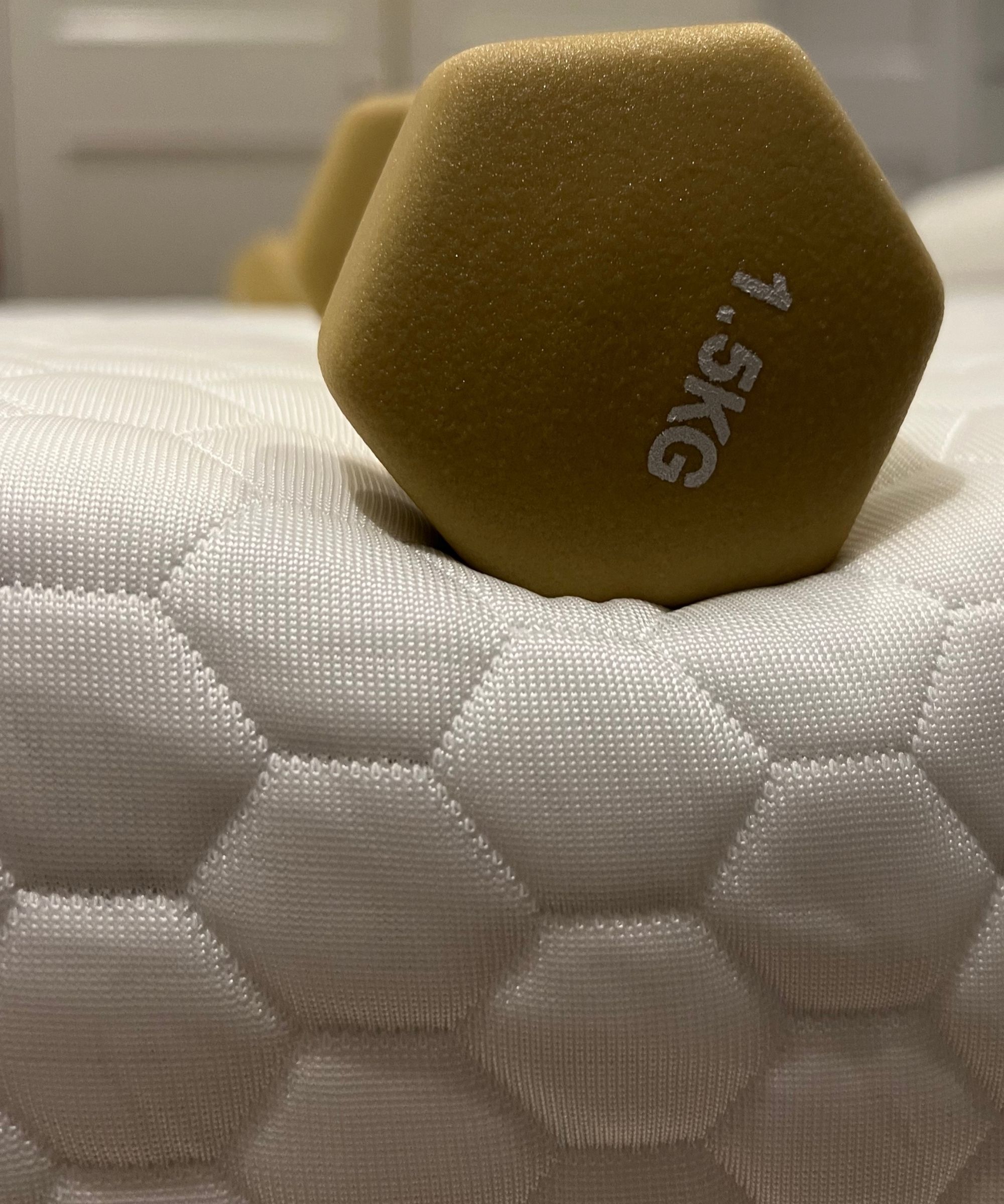 Testing the edge support of the Brooklyn bedding Microcoil mattress topper