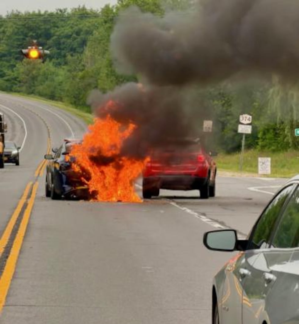 Fiery crash of New York State trooper vehicle at the intersection of Rand Hill Road and Route 374