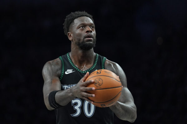FILE - Minnesota Timberwolves forward Julius Randle shoots during the first half of Game 3 of a NBA basketball second-round playoff series against the San Antonio Spurs, May 8, 2026, in Minneapolis. (AP Photo/Abbie Parr, File)
