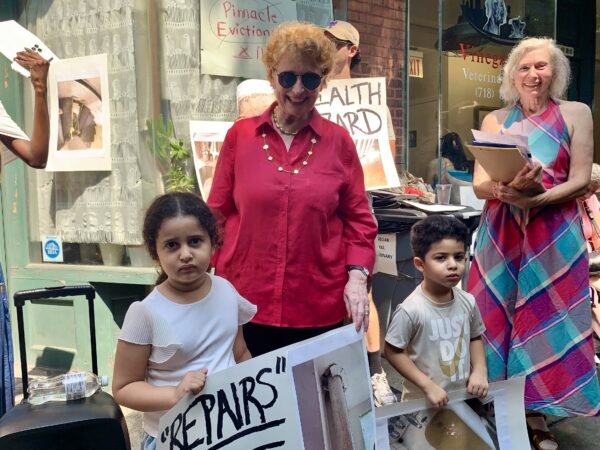 Assemblymember Jo Anne Simon stands with young tenants of the Riverside Houses. Photo: Mary Frost/Brooklyn Eagle