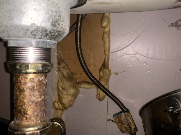 The Seidi family repaired a hole under the sink, where rats were coming in, by themselves. Photo: Mary Frost/Brooklyn Eagle
