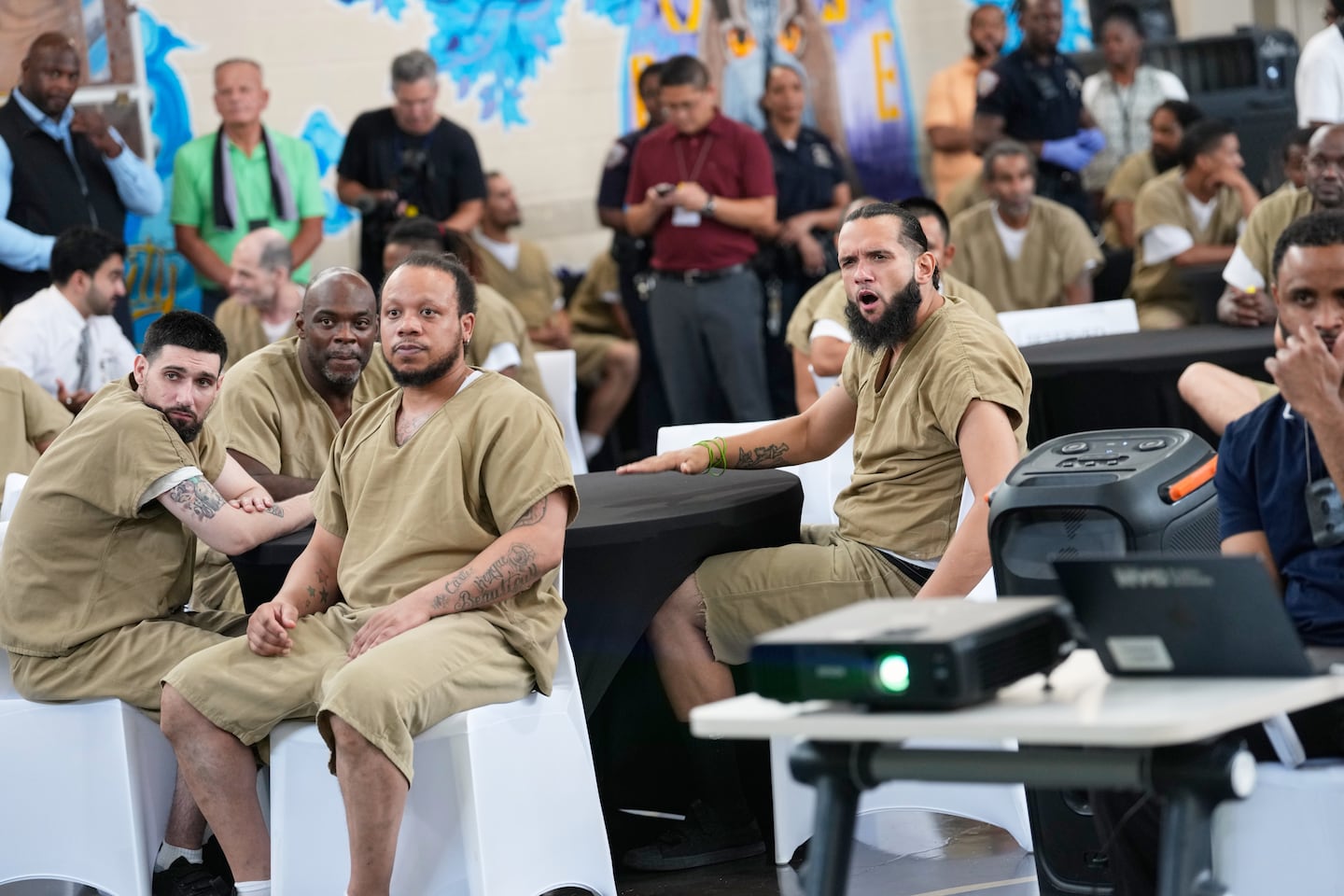 Rikers Island inmates react as they watch the World Cup semifinal soccer match between England and Argentina, at the jail complex in New York.