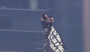 Daredevil couple climb spire atop Empire State Building in apparent marriage proposal
