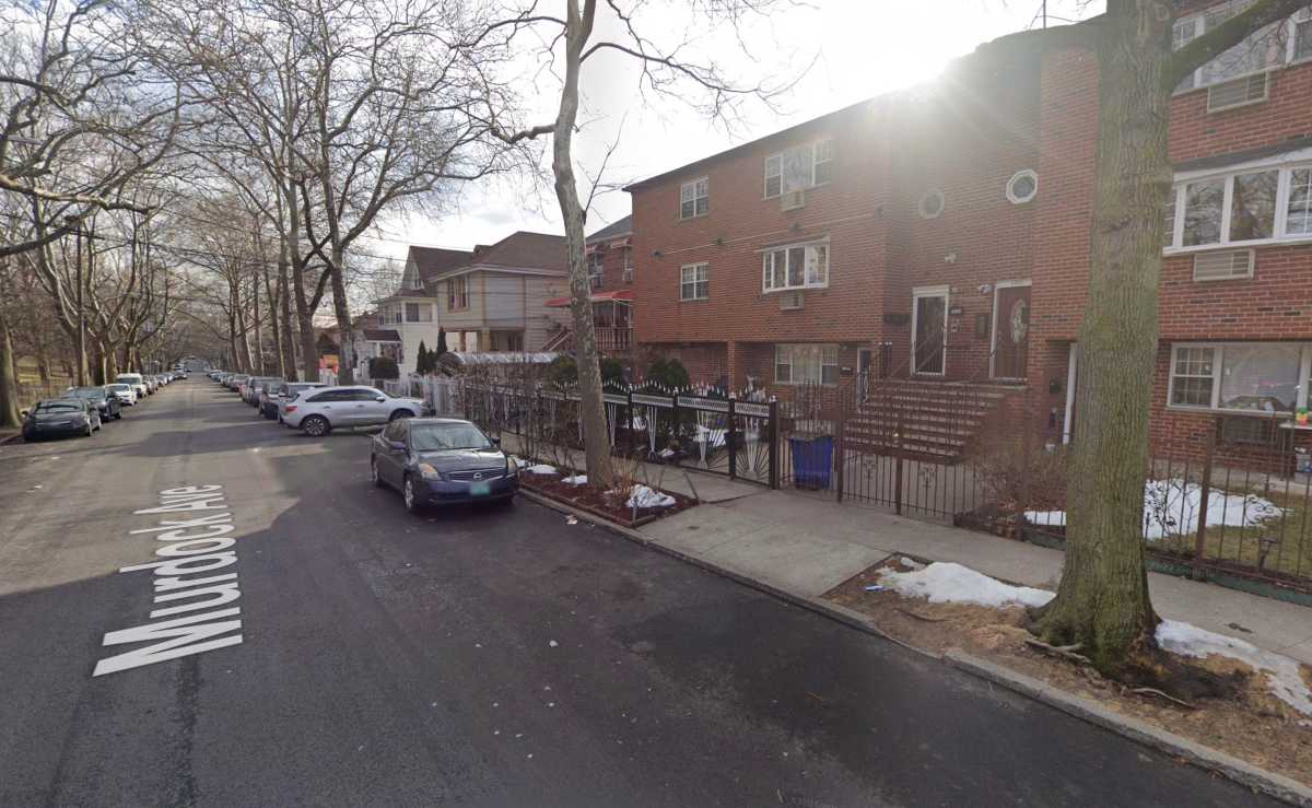 scene in the Bronx with homes where woman was shot dead