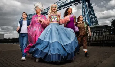 The cast of Smoggie Queens standing at Middlesbrough Docks