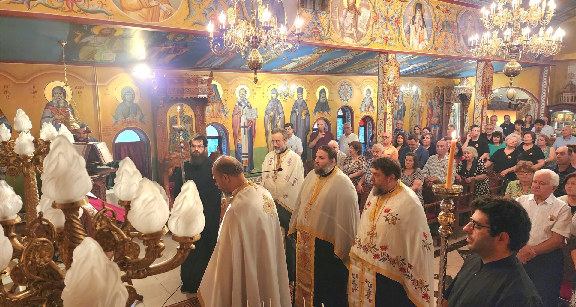 The Abbot of the Sacred Patriarchal and Stavropegial Orthodox Monastery of St. Irene Chrysovalantou, Archimandrite Meletios Bougas, presides over the Vespers service of St. Marina, flanked by the St. Nicholas-St. Marina community’s presiding priest Fr. Gerasimos Maroulas and clergy of the Sacred Monastery. Photo: TNH/Michael Kakias