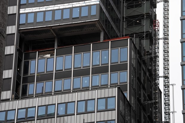 A building at the corner of E. 42nd St. and Second Ave. in Manhattan is pictured Tuesday, July 7, 2026, after the building was evacuated because of structural damage. 