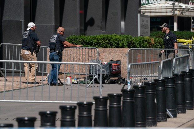 NYPD and law enforcement investigate the scene of a potential explosive device outside 26 Federal Plaza Monday morning July 20, 2026 in New York, New York. Four people were transported to the hospital following this incident. (Barry Williams/ New York Daily News)