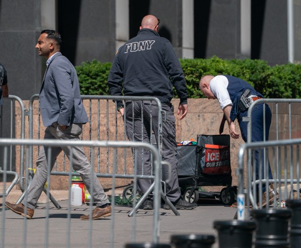 NYPD and law enforcement officers investigate the scene of an explosive device outside 26 Federal Plaza Monday, July 20, 2026 in Manhattan, New York. (Barry Williams/ New York Daily News)