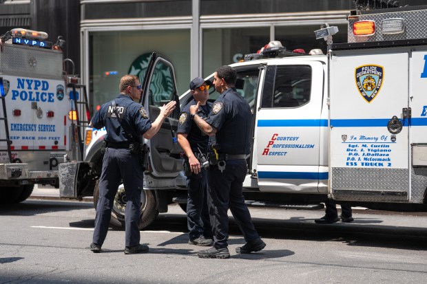 Police respond to the Empire State Building after a man and woman climbed to its top spire on Wednesday, July 1, 2026, in Manhattan, New York. (Barry Williams/ New York Daily News)