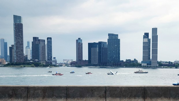 FDNY and NYPD vessels respond to a seaplane crash in the East River near 23rd St. in Manhattan on Sunday.
