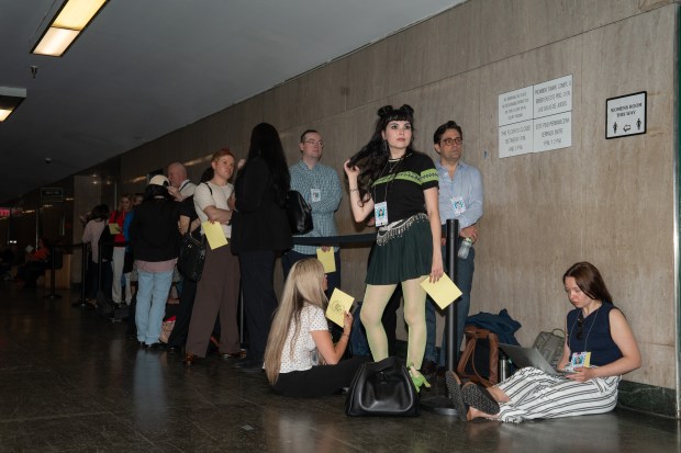 Journalists and Luigi Mangione supporters wait to enter the courtroom for Mangione's court appearance in Manhattan Supreme Court on June 17.