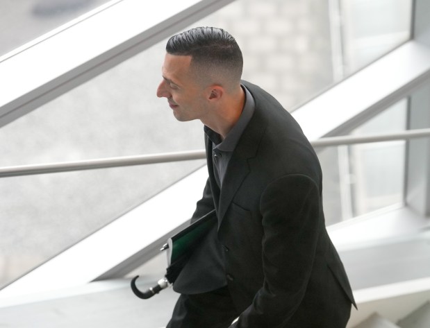 NYPD Officer Omar Habib walks into a courtroom in Bronx Supreme Court on Wednesday, July 29, 2026 in the Bronx. (Barry Williams/ New York Daily News)