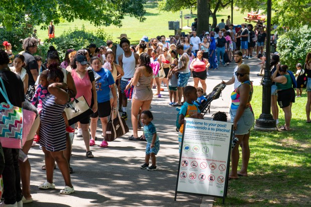 Throngs of people line up for a chance to beat the heat at the Van Cortlandt Pool inside Van Cortlandt Park in the Bronx on Friday, July 3, 2026. (Theodore Parisienne / New York Daily News)
