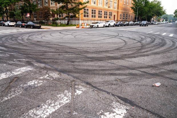 Tire marks are seen on McDonald Ave. and Albemarle Rd. in Brooklyn on Saturday.