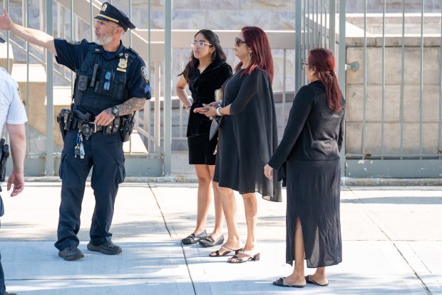 People arrive ahead of the funeral services for Staff Sgt. Angel Rampersad, a U.S. service member who was killed in an Iranian missile attack on an air base in Jordan, at the Calvary Assembly of God Church on Rockaway Blvd. in Ozone Park, Queens, on Friday, July 31, 2026. (Theodore Parisienne / New York Daily News)