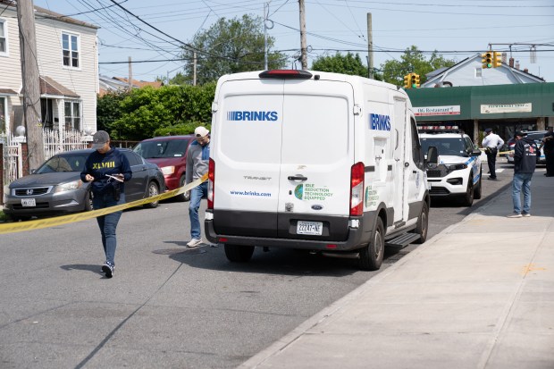 Police investigate a Brinks truck robbery outside a bank on Linden Blvd. in Queens on June 2, 2025.