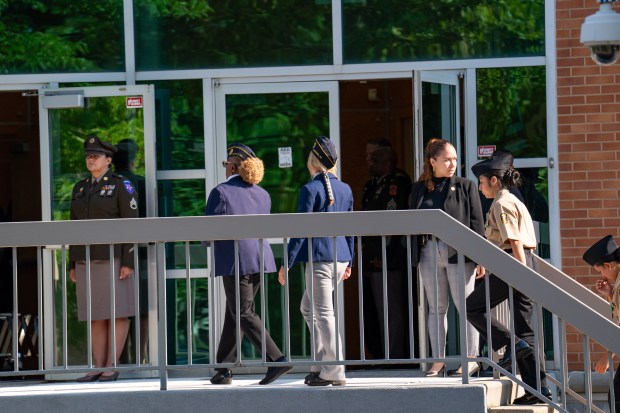 People arrive ahead of the funeral services for Staff Sgt. Angel Rampersad, a U.S. service member who was killed in an Iranian missile attack on an air base in Jordan, at the Calvary Assembly of God Church on Rockaway Blvd. in Ozone Park, Queens, on Friday, July 31, 2026. (Theodore Parisienne / New York Daily News)