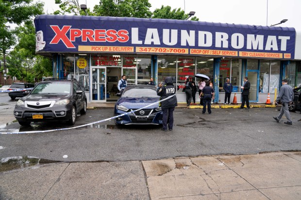 A gunman fatally shot Kevon Lee and grazed a second victim inside Xpress Laundromat on Utica Ave. near Avenue J in Flatlands, Brooklyn, on Monday, May 25, 2026. (Theodore Parisienne / New York Daily News)