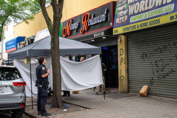 Police investigate after Yeimi Gabriel Reyes was fatally shot in the basement of a Bronx lounge on Thursday. 