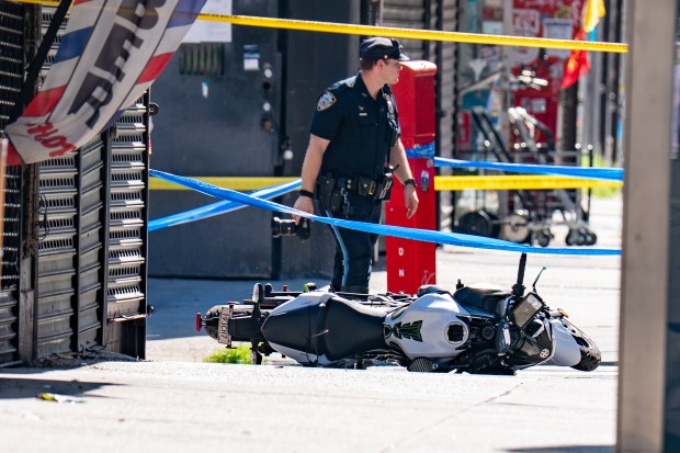Police investigate after Jorge Palaquibay was fatally struck by a box truck on Roosevelt Ave. in Woodside on July 2.