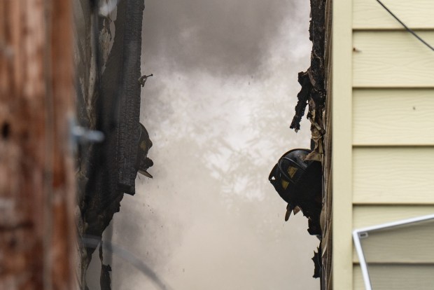 Five firefighters were hurt when a massive four-alarm blaze destroyed two homes after a fire erupted in the basement of a Briggs Ave. home near E. 194th St. in the Bronx on Thursday, July 16, 2026. (Theodore Parisienne / New York Daily News)
