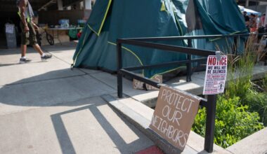 A sign outside the encampment