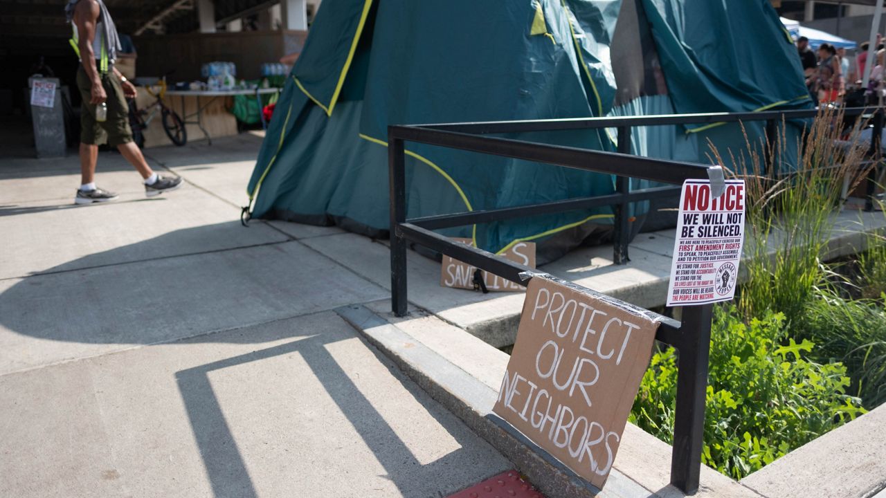 A sign outside the encampment