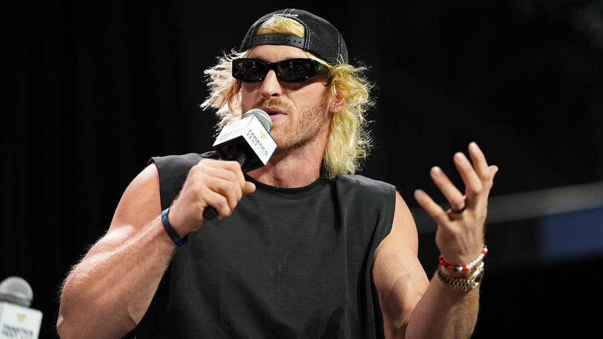 Logan Paul speaks onstage during a panel at Fanatics Fest NYC.